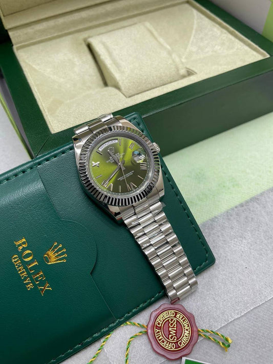 Rolex Oyster Perpetual Day-Date Watches in White Gold with President Bracelets.