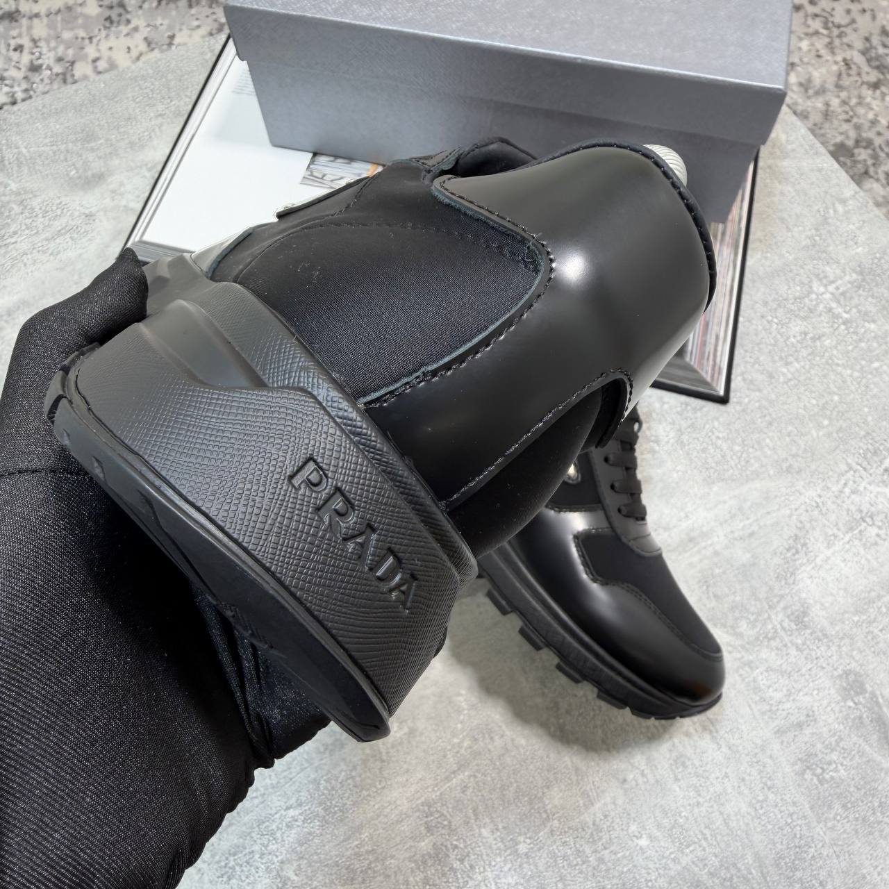 Prada Prax 01 Sneakers in Black