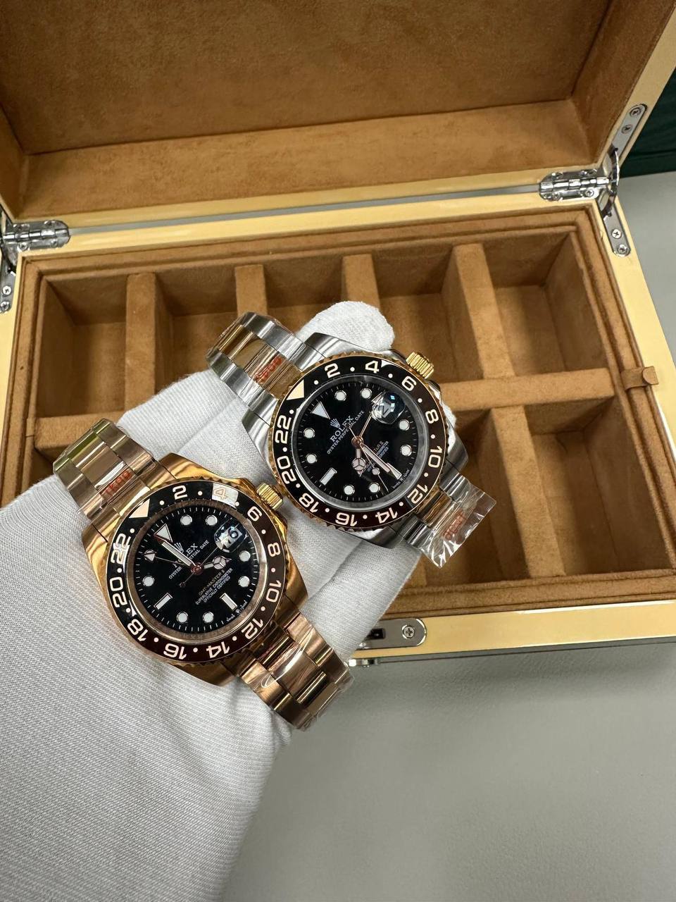 Rolex GMT-Master II Watches, Specifically the "Root Beer" Models Featuring Everose Gold and a Black Dial and Bezel