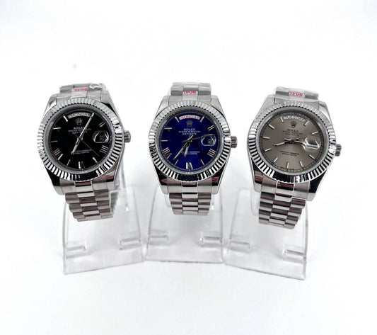 Rolex Oyster Perpetual Day-Date Watches with a President Bracelet.