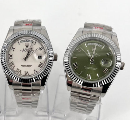 Rolex Oyster Perpetual Day-Date Watches in White Gold with President Bracelets.