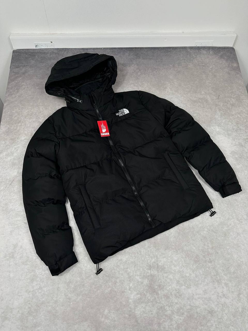 The North Face Aspen Air Ex Jacket with a Stowable Hood in the Collar