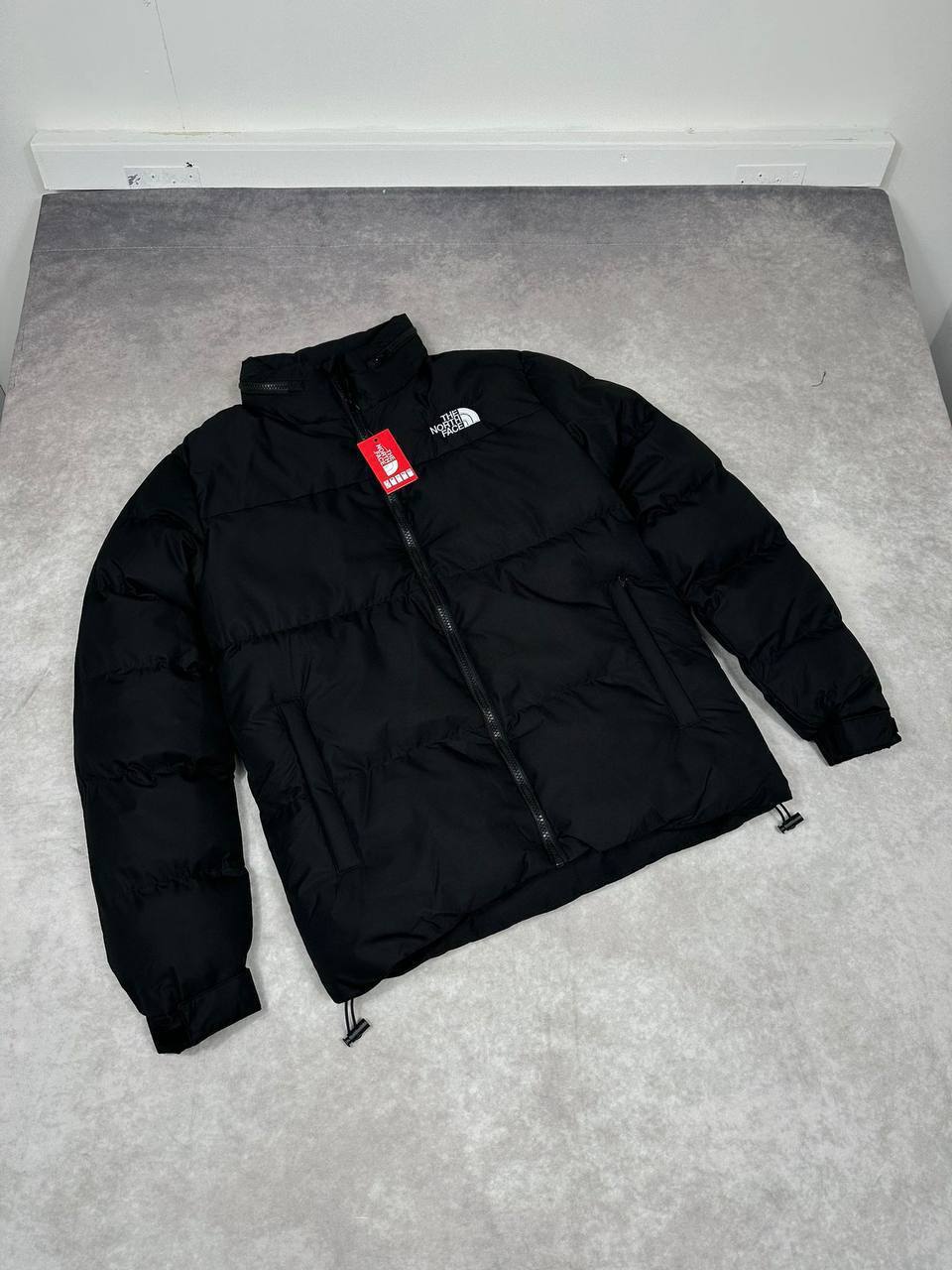 The North Face Aspen Air Ex Jacket with a Stowable Hood in the Collar