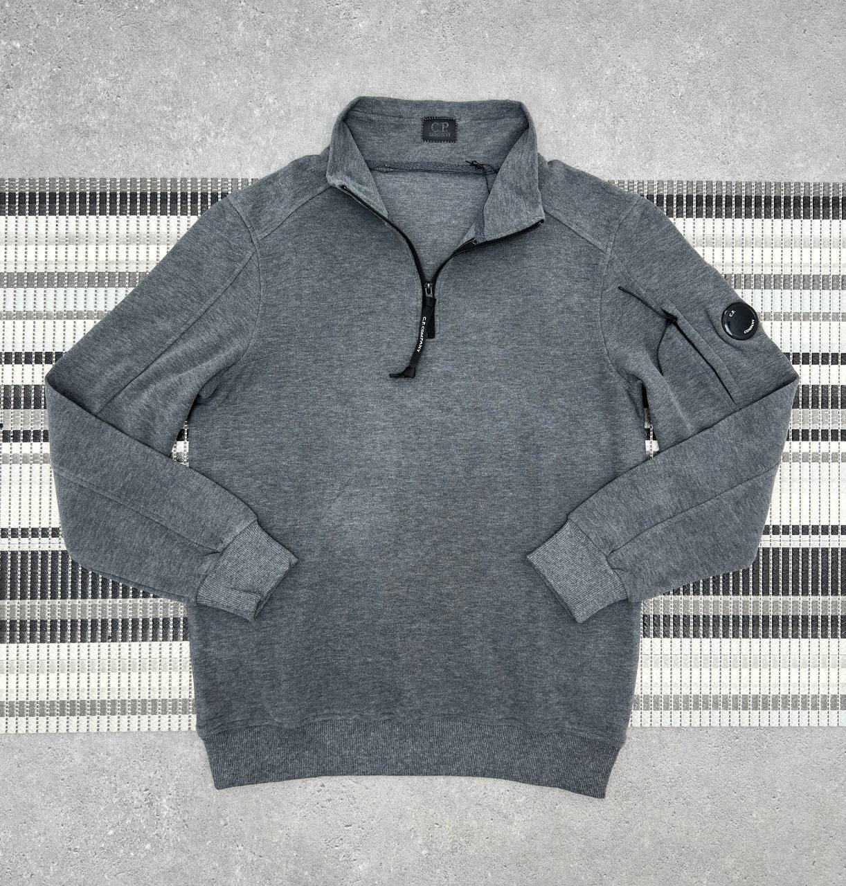 C.P. Company Quarter-Zipper Sweatshirt with a Lens Detail on the Sleeve
