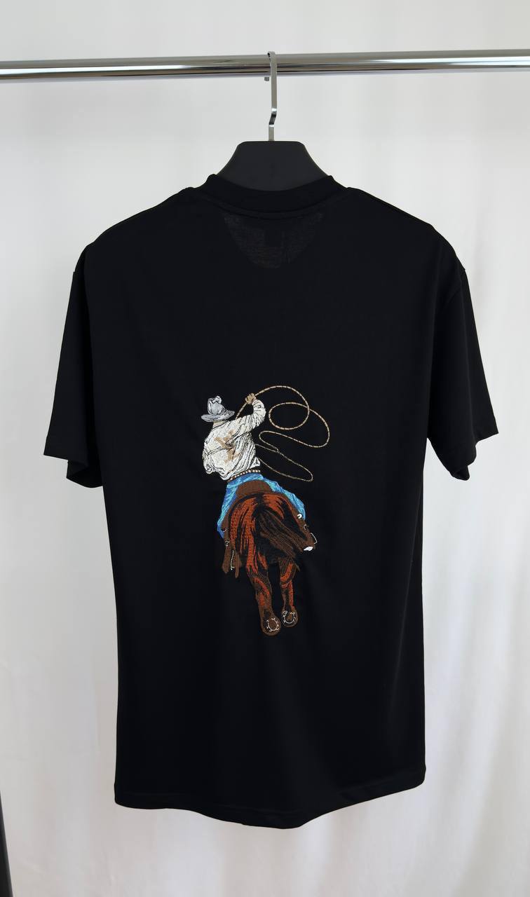 Louis Vuitton Graphic Embroidered Cotton T-Shirt, Featuring a Cowboy Motif with a Lasso & an LV Ropes Signature