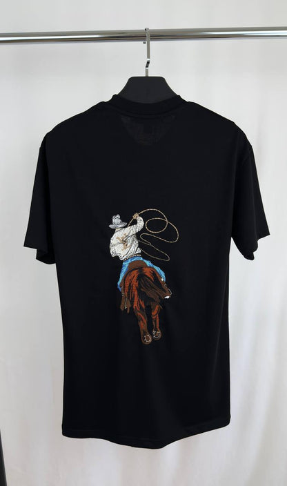 Louis Vuitton Graphic Embroidered Cotton T-Shirt, Featuring a Cowboy Motif with a Lasso & an LV Ropes Signature