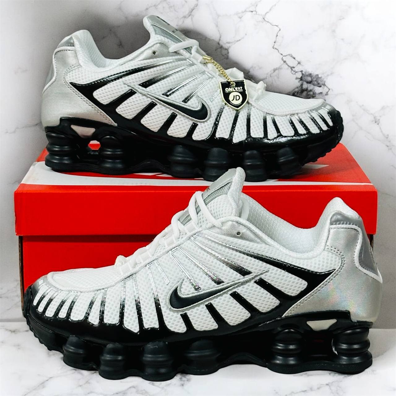 Nike Shox TL Shoes , a Recrafted Version of the 2003 Icon Featuring Full-Length Nike Shox Technology for Optimal Impact Absorption