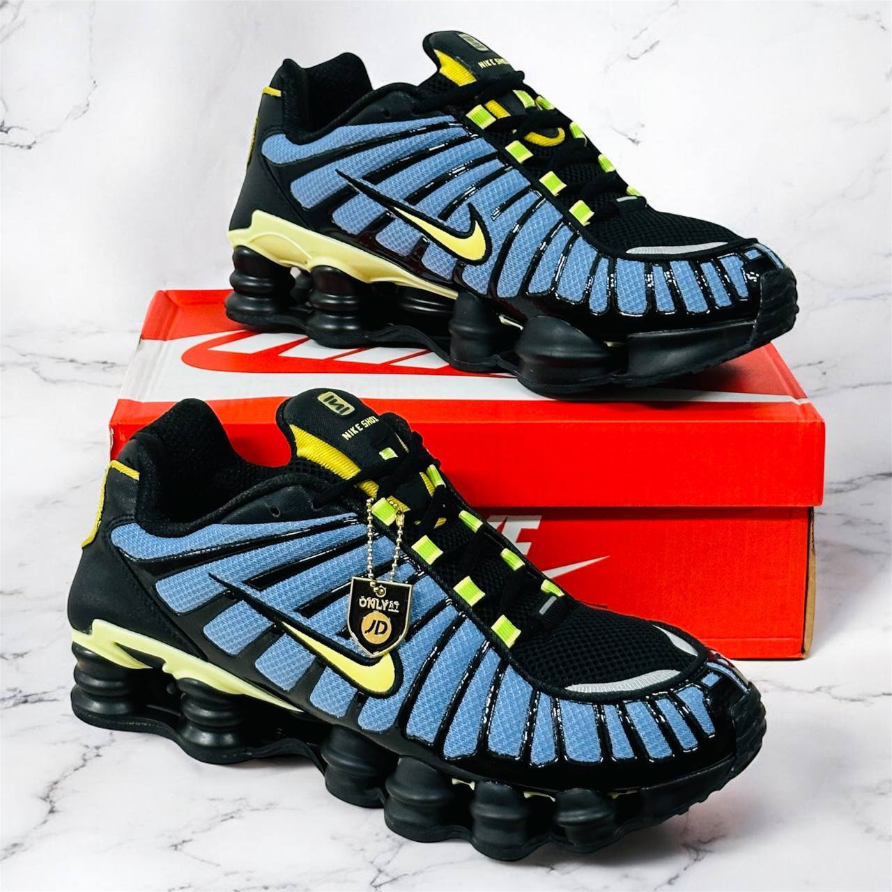 Nike Shox TL in a "Thunderstorm" with the Style Code CI7692-400