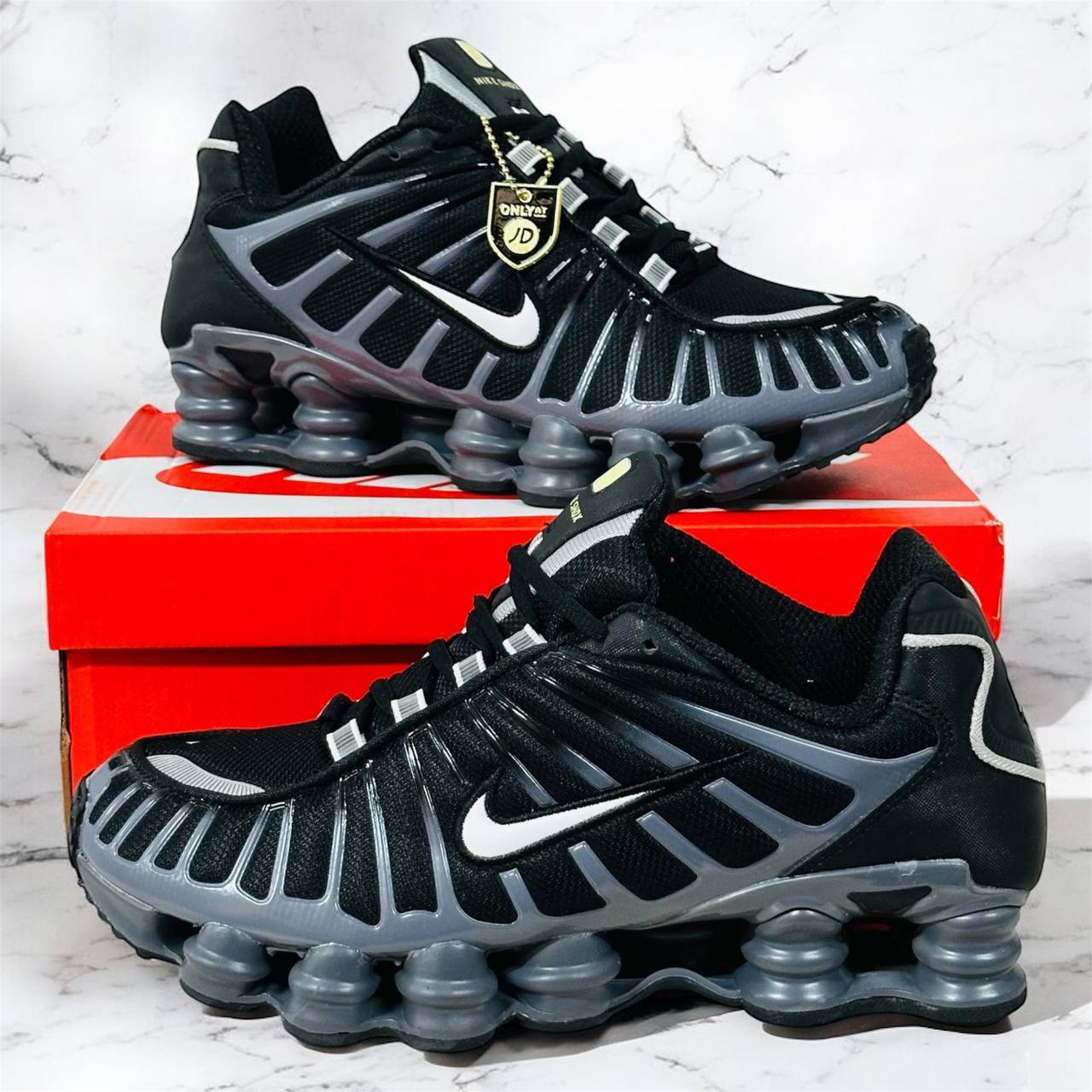 Nike Shox TL in a "Thunderstorm" with the Style Code CI7692-400