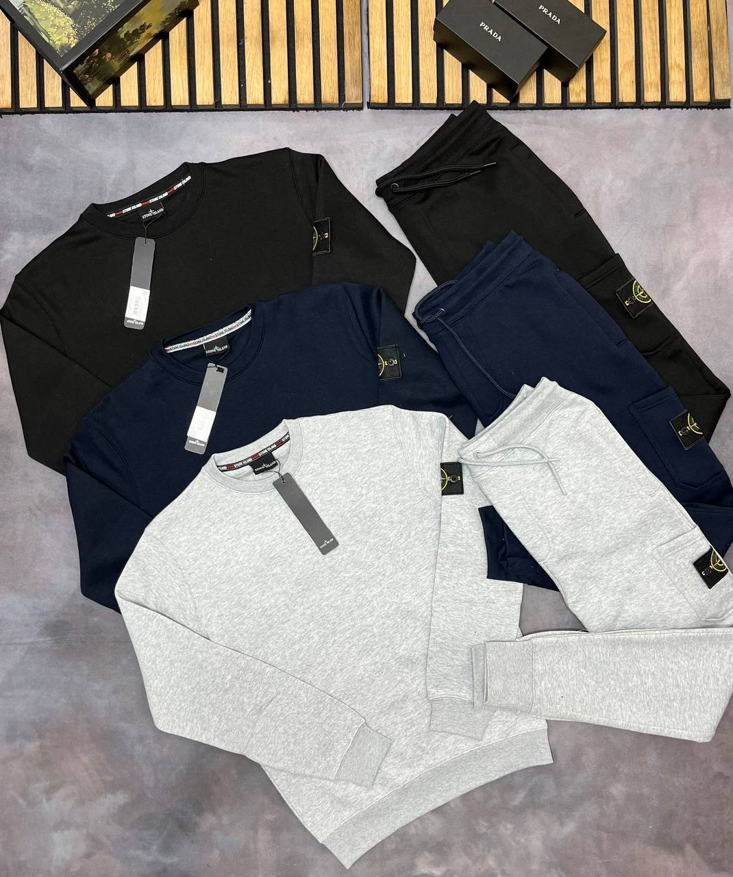 Stone Island Tracksuit with Brand's Iconic Compass Badge.